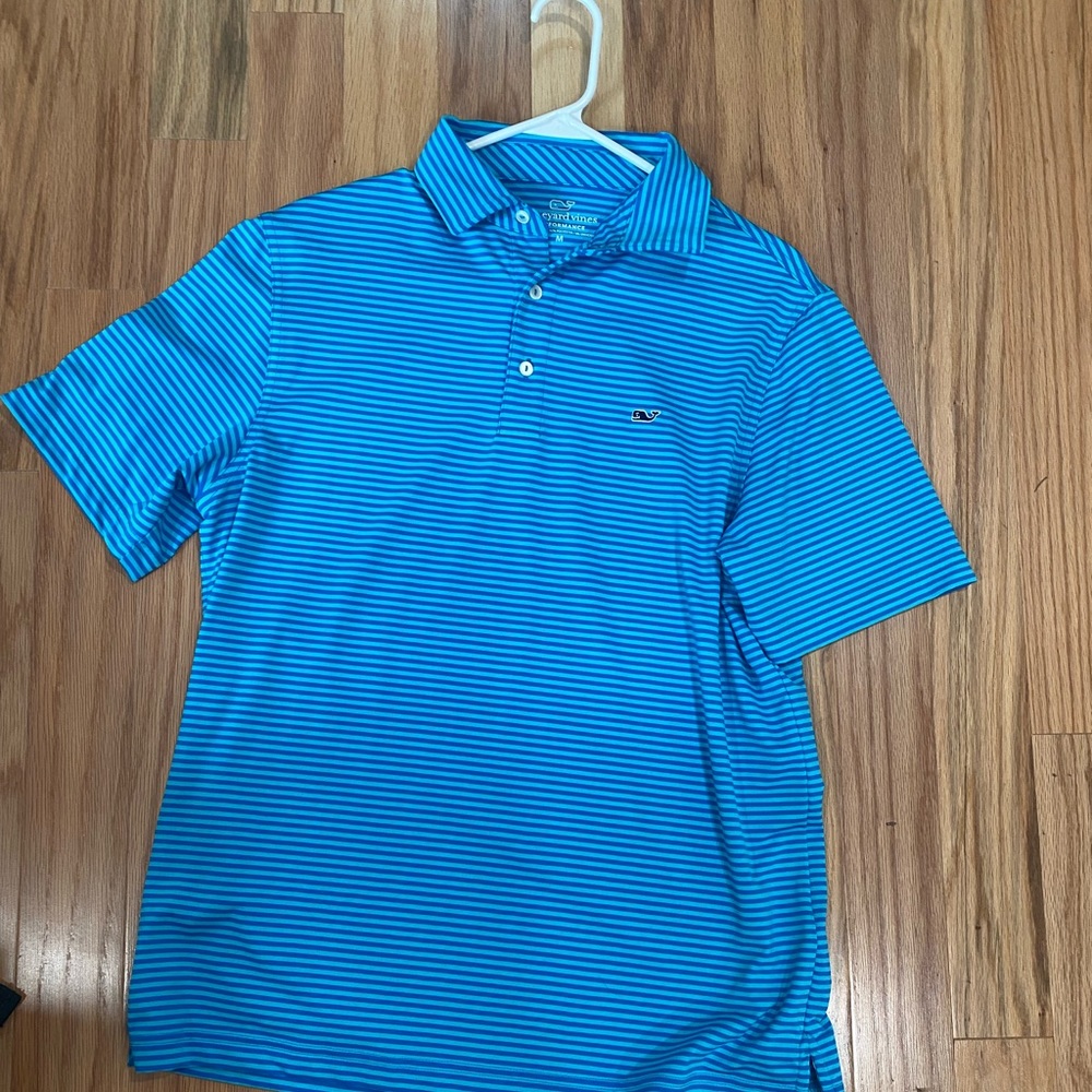 Blue and white striped vineyard vines polo